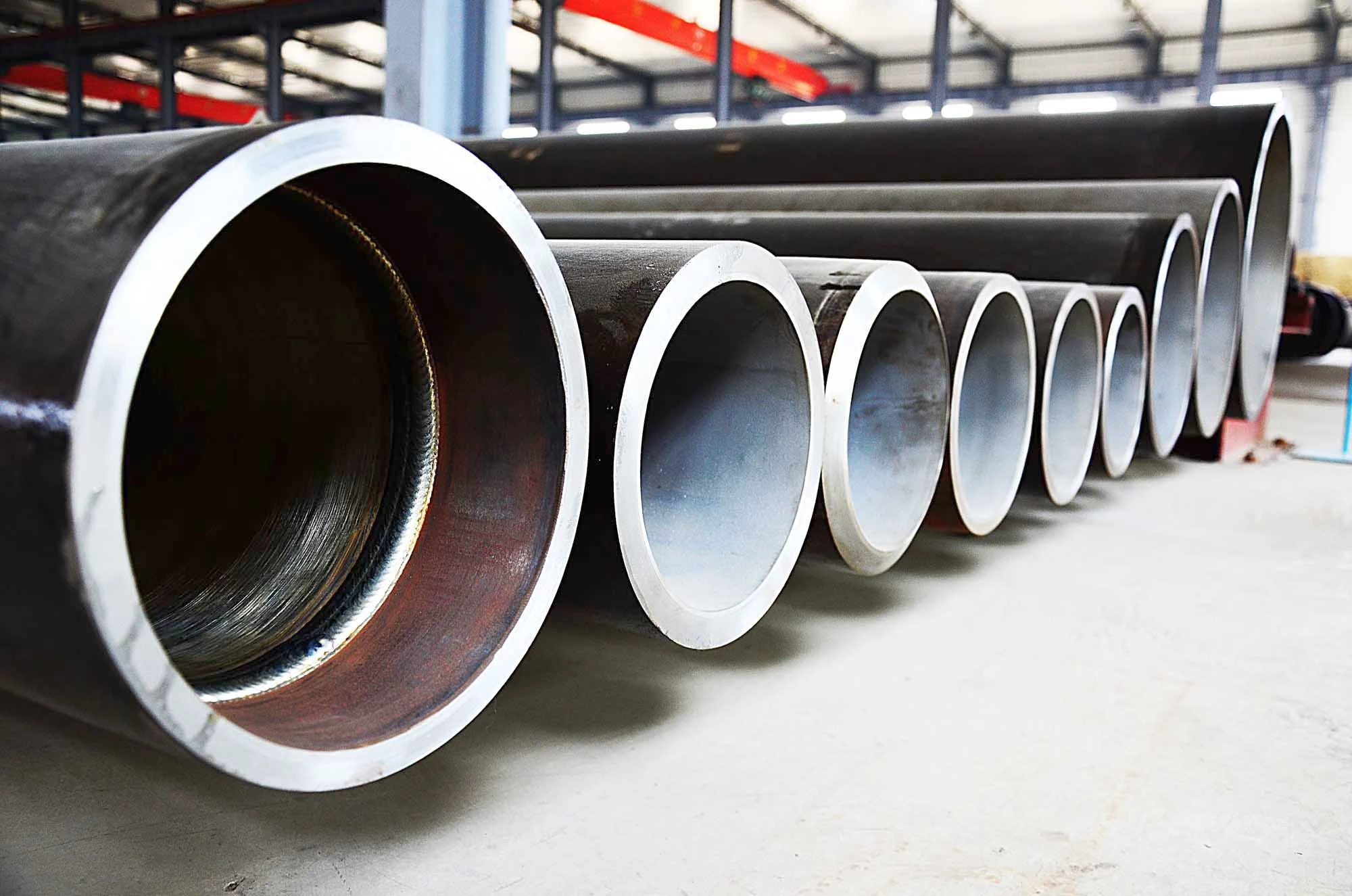 Плакированная труба электросварная 610 мм 14 мм 5L Gr.X46 + LC 2242 API 5LD